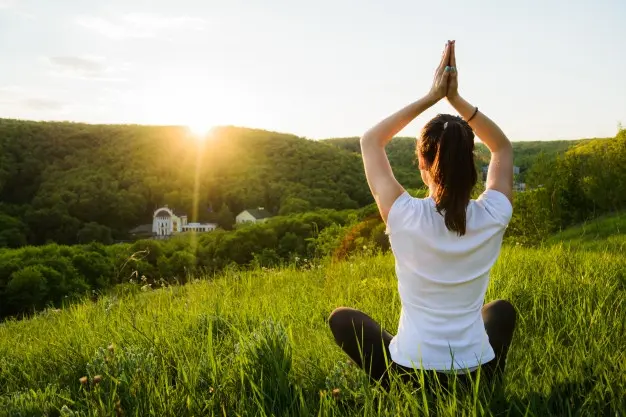 Woman receiving holistic bodywork therapy for balance and relaxation